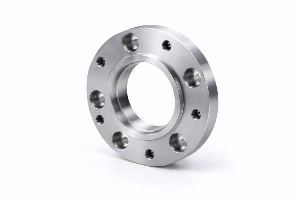 Round machined metal flange with counterbored and threaded holes